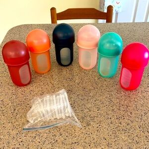 Six 8 oz silicone baby bottles
